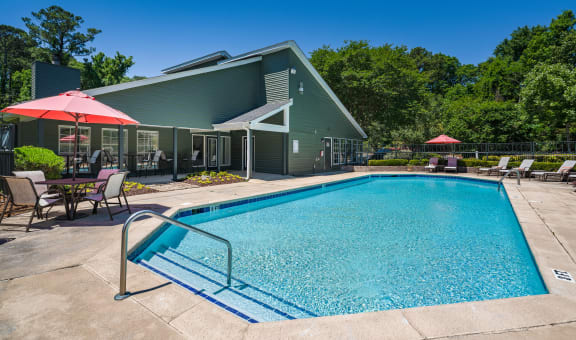Sparkling Pool & Sundeck With Clubhouse Overlooking