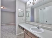 Thumbnail 12 of 28 - A bathroom with a sink, mirror, and medicine cabinet at Landmark at Lyncrest Reserve Apartments, Nashville, TN, 37209