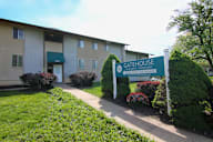a building with a gate house sign in front of it at Gatehouse Apartments, Kansas City, 64134