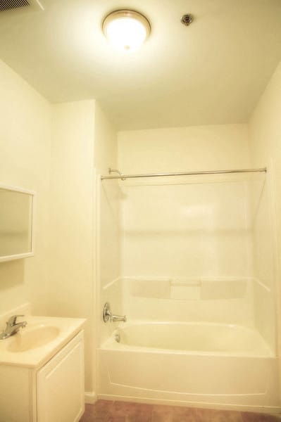 Bathroom with sink, bathtub and shower