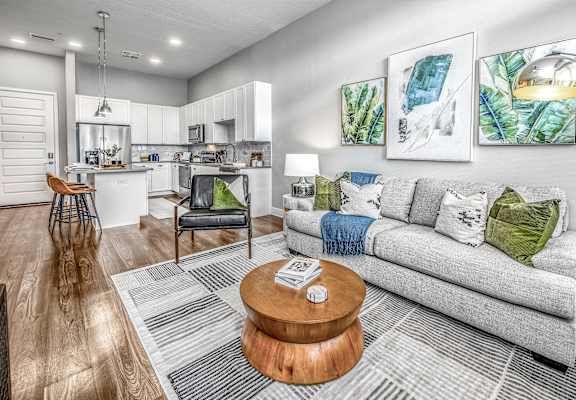a living room with a couch and a coffee table
