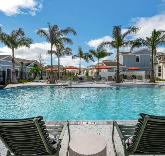 Pool With Relaxing Chairs at The Boardwalk at Tradition, Port St Lucie, FL, 34987