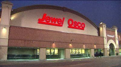 The image shows a storefront with a red signboard that reads "dozvolka" and "601 DEMPSTER STREET".