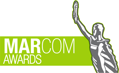A green banner with the words MARCOM AWARDS on it.