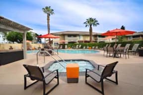 Spa and pool with chairs at Mirabella Apartments, 40300 Washington Street, 92203