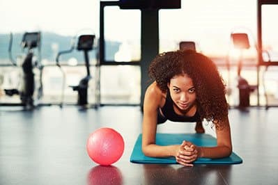 Girl-In-Gym at Link Apartments® Glenwood South, Raleigh, NC