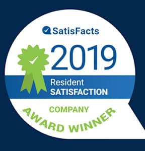 A badge indicating a company as the award winner for resident satisfaction in 2019.
