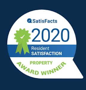 A badge indicating a property award winner for resident satisfaction in 2020.