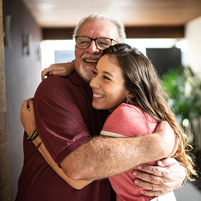 a man and a woman hugging