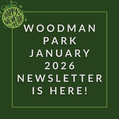 a green sign with the words woodman park september 23 newsletter is here