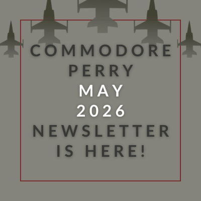 A yellow square with black text announcing the Commodore Perry December 2024 Newsletter.