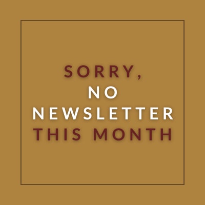 a red wall with a sign that saysstonebridge apartment homes may 23 23 newsletter is here