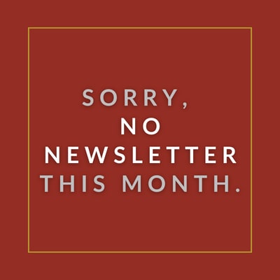 A red background with a message apologizing for no newsletter this month.