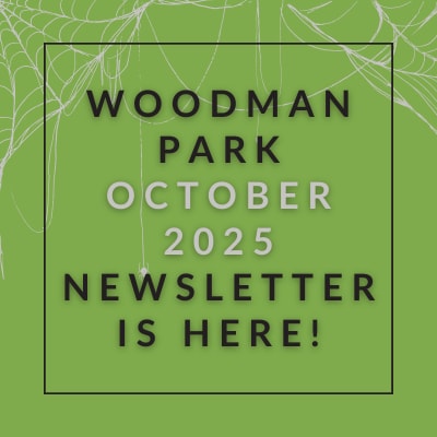 a green sign with the words woodman park october 23 newsletter is here