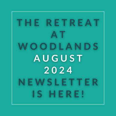 a aqua background with a white font with the words the retreat at woodlands