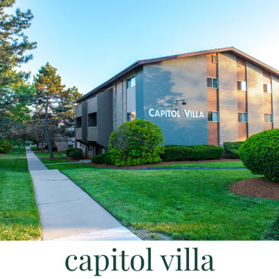 A building with the name Capitol Villa on it.
