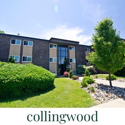 Collingwood building with green bushes in front.