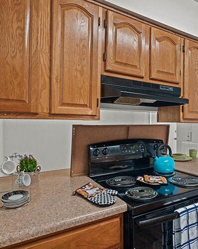 a kitchen with a stove and a counter top