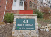 Thumbnail 2 of 8 - Exterior of building with sign