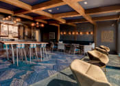 Thumbnail 2 of 11 - a large room with chairs and tables and a large window