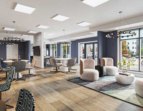 A modern cafe with a variety of seating options and a view of the city.