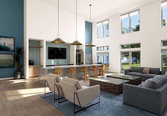 A modern living room with a grey sofa, a glass coffee table, and a large window.