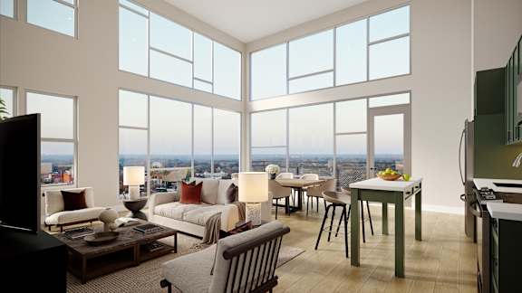 A living room with a view of the city.at The Ace, Richmond Virginia