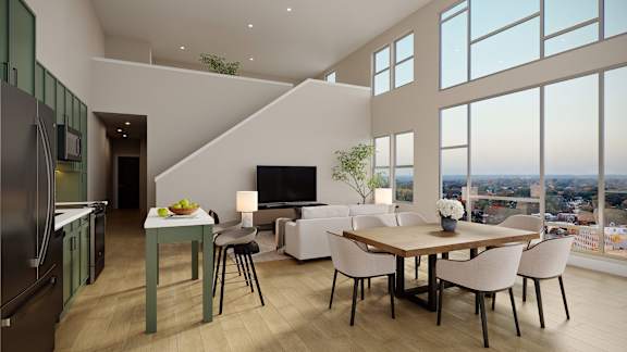 A modern kitchen with a dining table and chairs.at The Ace, Richmond, 23230