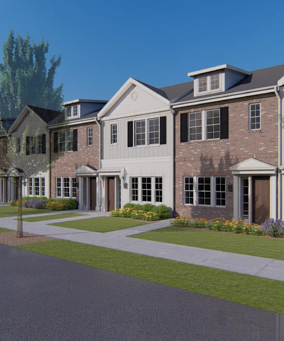 a rendering of a row of townhomes with a street and sidewalk in front