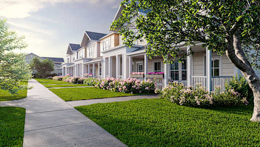 Row of houses with Lush green lawns at Allier Heartwood, Richmond Hill, GA, 31324