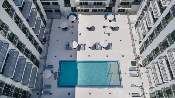 the pool area of a cruise ship with a swimming pool