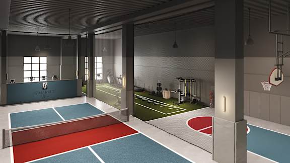 A basketball court is located inside a building.