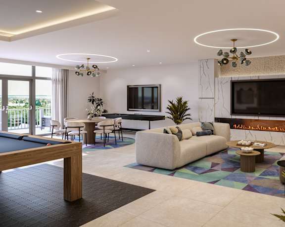 A modern living room with a pool table and a fireplace.