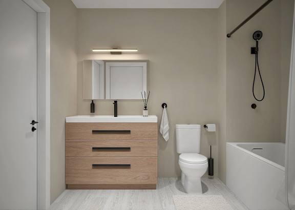 a bathroom with a toilet sink and bathtub