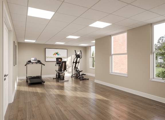 A room with exercise equipment and a sign that says  at Divinity Landing Apartments, Macedonia, 44056