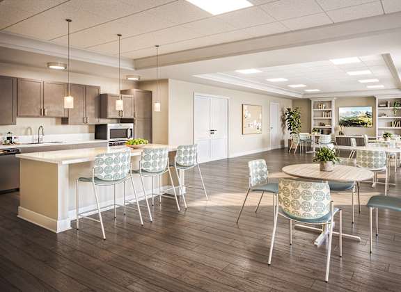 A modern kitchen with a dining table and chairs. at Evergreen Heights Apartments, Toledo, 43614