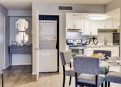 Thumbnail 5 of 15 - a kitchen and dining room with a table and chairs at Summers Point Apartments, Glendale
