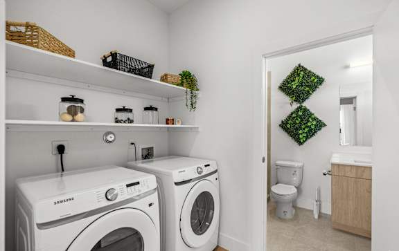 A laundry room with a washer and dryer.