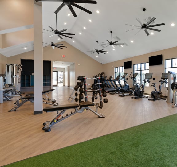 a spacious fitness center with treadmills and other exercise equipment  at Upland Flats, Colorado Springs, CO