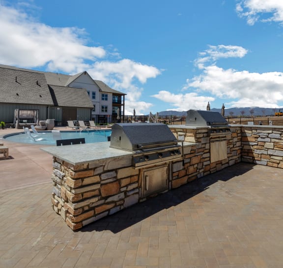 take a dip in the pool at villas at houston levee west apartments in cord  at Upland Flats, Colorado Springs