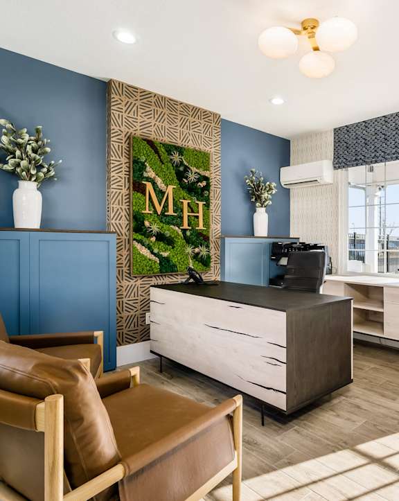 a rendering of a hotel lobby with people sitting at a reception desk