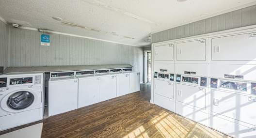 A laundry room with a washer and dryer.