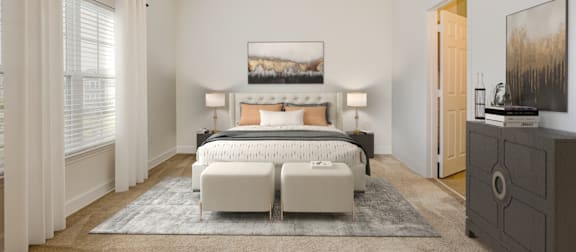 A bedroom with a large bed, a ceiling fan, and a painting on the wall. at Stone Gate Apartments, North Carolina, 28390