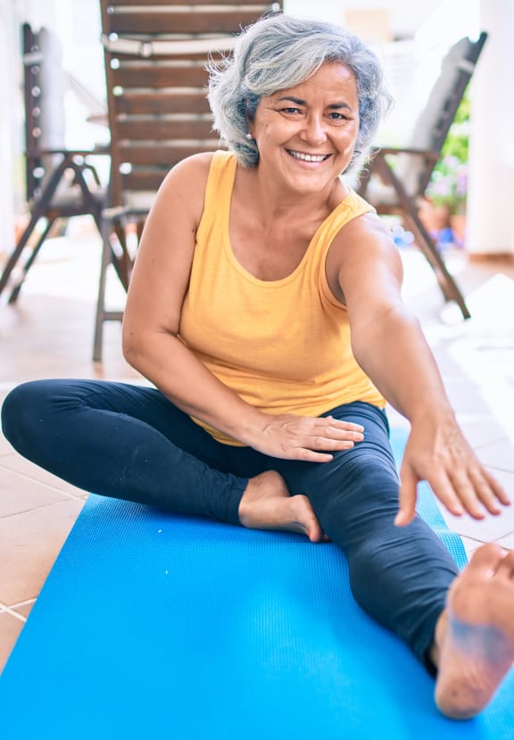 Lifestyle photo of woman stretching