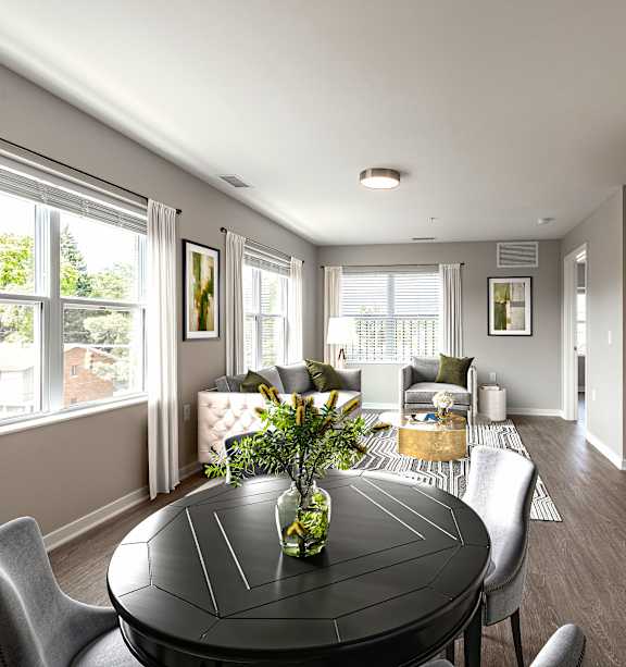 Room with sofa and entertainment center at Collingwood Green Living Apartments, Toledo