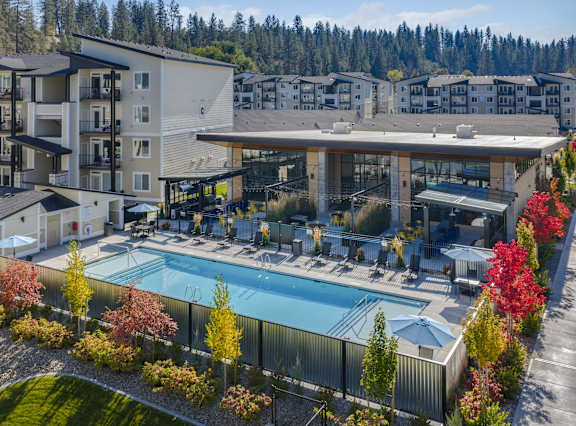 A large building with a pool in the middle of it.