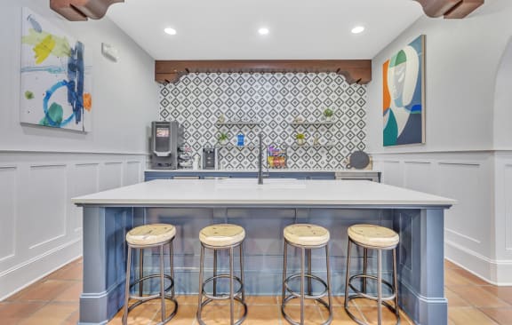 a living room with a bar and a television at The Atlantic Mira Loma, Live Oak, TX, 78233