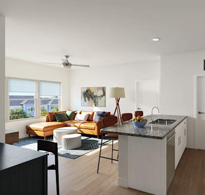 A modern kitchen with a refrigerator, sink, and stove.
