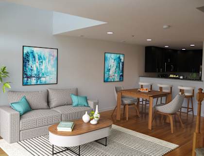 a living room with a couch and a table