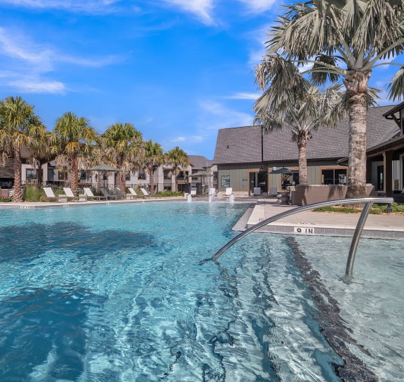 a swimming pool with a couch at Canter, Ocala, Florida
